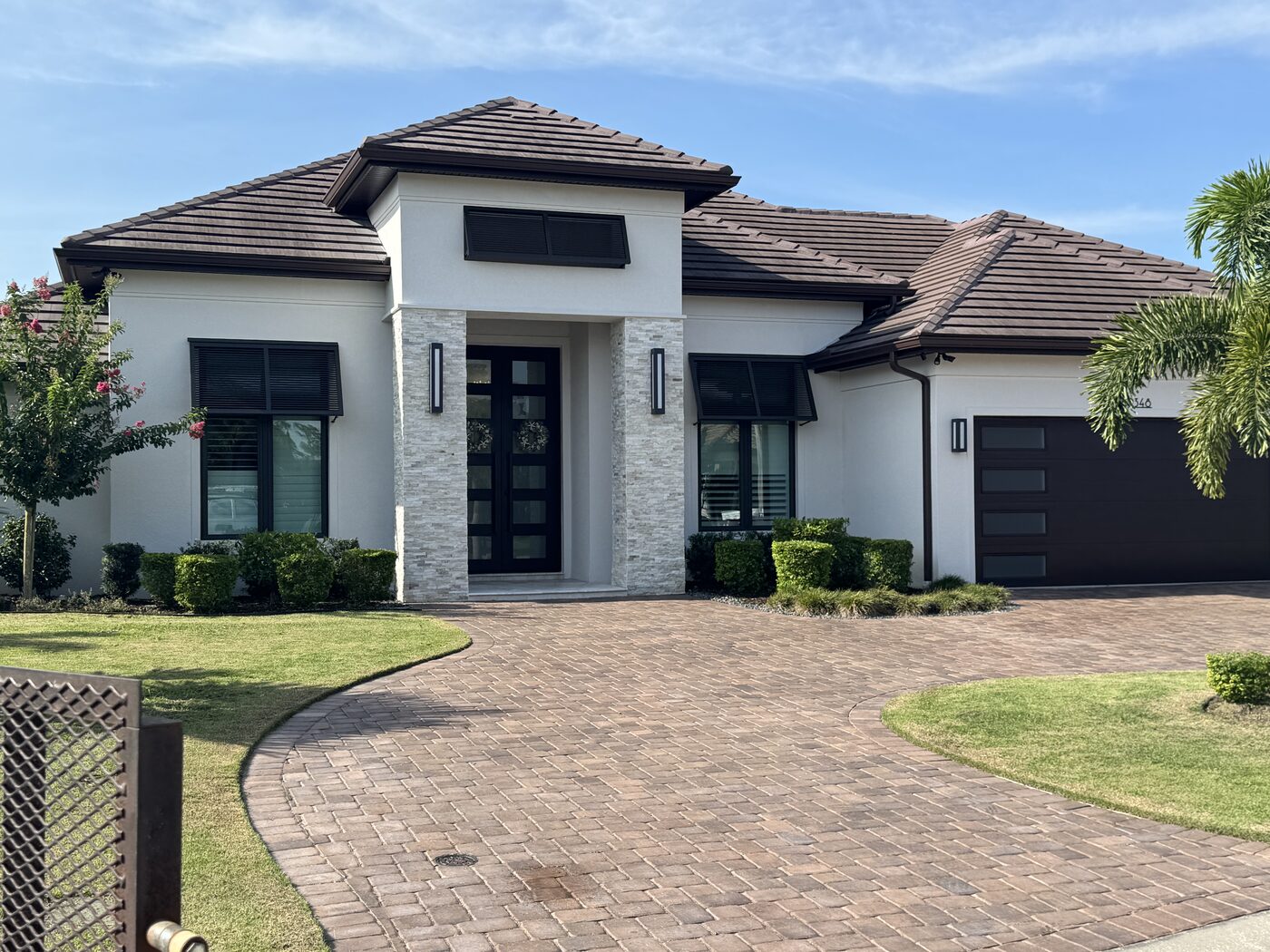Detailed landscaping and clean bed edges at a home's entryway in Lakeland, FL